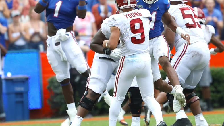 Florida Gators linebacker Brenton Cox Jr. (1) rises up to try for an interception but dropped it during the football game between the Florida Gators and The Alabama Crimson Tide, at Ben Hill Griffin Stadium in Gainesville, Fla. Sept. 18, 2021.

Flgai 09182021 Ufvs Bama 29
