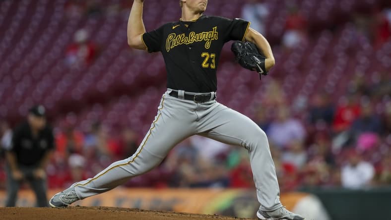 Sep 21, 2021; Cincinnati, Ohio, USA; Pittsburgh Pirates starting pitcher Mitch Keller (23) throws against the Cincinnati Reds in the first inning at Great American Ball Park. Mandatory Credit: Katie Stratman-USA TODAY Sports