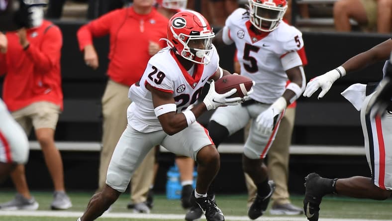 Sep 25, 2021; Nashville, Tennessee, USA; Georgia Bulldogs defensive back Christopher Smith (29) runs after an interception during the first half against the Vanderbilt Commodores at Vanderbilt Stadium. Mandatory Credit: Christopher Hanewinckel-USA TODAY Sports
