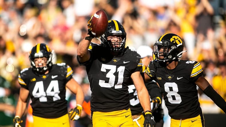 Iowa linebacker Jack Campbell (31) celebrates with teammates after getting a stop during a NCAA non-conference football game against Colorado State, Saturday, Sept. 25, 2021, at Kinnick Stadium in Iowa City, Iowa.

210925 Colo St Iowa Fb 030 Jpg