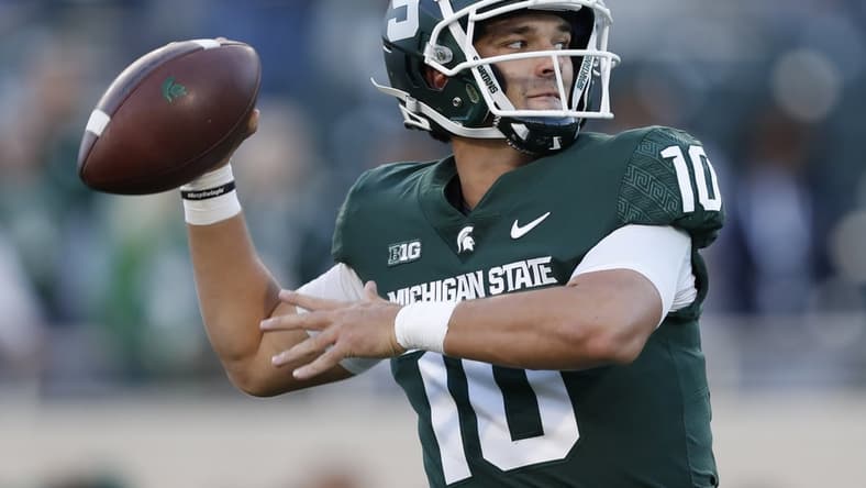 Sep 25, 2021; East Lansing, Michigan, USA; Michigan State Spartans quarterback Payton Thorne (10) warms up before the game against the Nebraska Cornhuskers at Spartan Stadium. Mandatory Credit: Raj Mehta-USA TODAY Sports