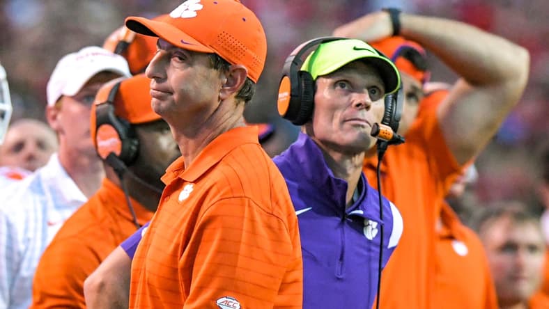 Clemson head coach Dabo Swinney and defensive coordinator Brent Venables react during the fourth quarter at Carter-Finley Stadium in Raleigh, N.C., September 25, 2021.

Ncaa Football Clemson At Nc State