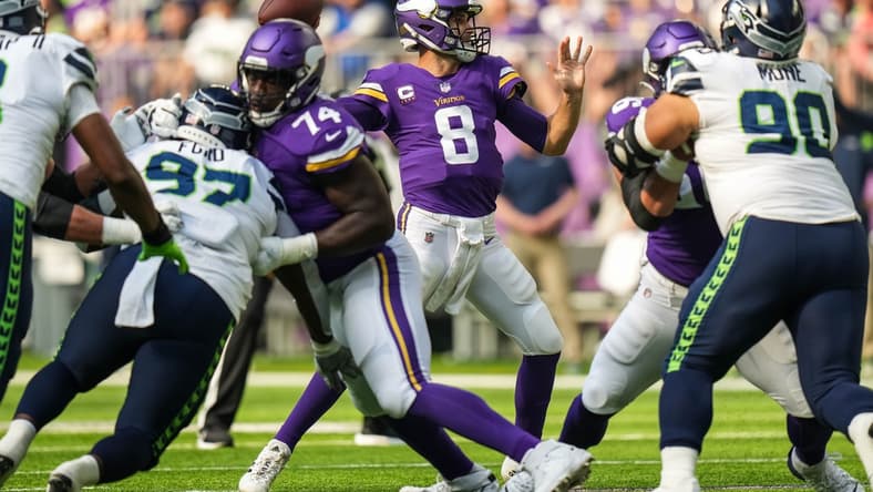 Sep 26, 2021; Minneapolis, Minnesota, USA; Minnesota Vikings quarterback Kirk Cousins (8) throws the ball during the first quarter against Seattle Seahawks at U.S. Bank Stadium. Mandatory Credit: Brace Hemmelgarn-USA TODAY Sports