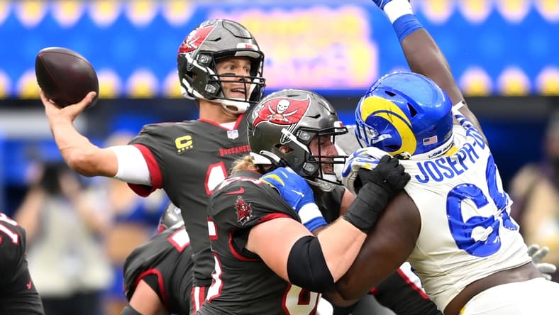 Sep 26, 2021; Inglewood, California, USA; Los Angeles Rams defensive tackle Sebastian Joseph-Day (69) pressures Tampa Bay Buccaneers quarterback Tom Brady (12) as he looks to throw a pass in the first half of the game at SoFi Stadium. Mandatory Credit: Jayne Kamin-Oncea-USA TODAY Sports