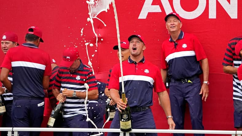 Sep 26, 2021; Haven, Wisconsin, USA; Team USA player Bryson DeChambeau celebrates after the United States beat Europe for the 43rd Ryder Cup golf competition at Whistling Straits. Mandatory Credit: Kyle Terada-USA TODAY Sports