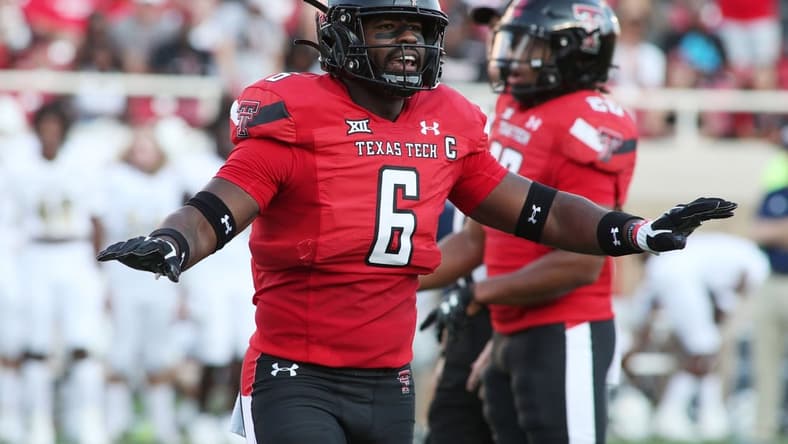 Sep 18, 2021; Lubbock, Texas, USA; Texas Tech Red Raiders defensive linebacker Riko Jeffers (6) signals in the first half in the game against the Florida International Panthers at Jones AT&T Stadium. Mandatory Credit: Michael C. Johnson-USA TODAY Sports
