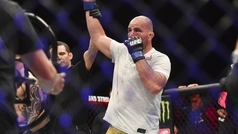 May 13, 2020; Jacksonville, Florida, USA; Glover Teixeira (blue gloves) celebrates after defeating Anthony Smith (red gloves) during UFC Fight Night at VyStar Veterans Memorial Arena. Mandatory Credit: Jasen Vinlove-USA TODAY Sports