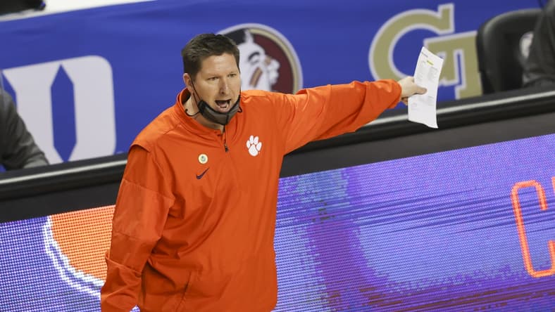 Mar 10, 2021; Greensboro, North Carolina, USA; Clemson Tigers head coach Brad Brownell yells at an official as his team plays the Miami Hurricanes during the second half in the second round of the 2021 ACC tournament at Greensboro Coliseum. The Miami Hurricanes won 67-64. Mandatory Credit: Nell Redmond-USA TODAY Sports