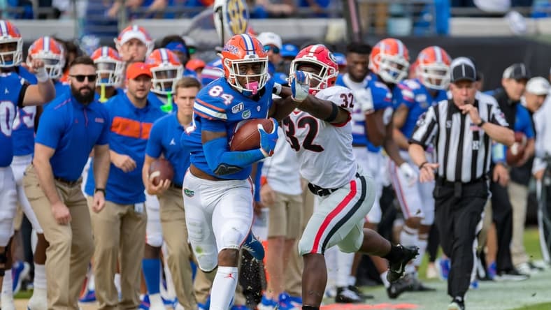 Florida Gators tight end Kyle Pitts (84) runs after a catch during the game featuring the #6 Florida Gators and the #8 Georgia Bulldogs at TIAA Bank Field in Jacksonville, FL on Saturday, November 2, 2019. [Matt Pendleton/Correspondent]

Fl Gai 1102 Flgagamer 4318