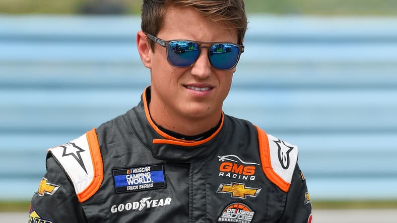 Aug 7, 2021; Watkins Glen, NY, USA; NASCAR Camping World Truck Series driver Zane Smith (21) looks on prior to the United Rentals 176 at Watkins Glen International. Mandatory Credit: Rich Barnes-USA TODAY Sports