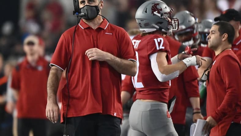 Sep 4, 2021; Pullman, Washington, USA; Washington State Cougars head coach Nick Rolovich looks during a gam e against the Utah State Aggies in the first half at Gesa Field at Martin Stadium. Mandatory Credit: James Snook-USA TODAY Sports