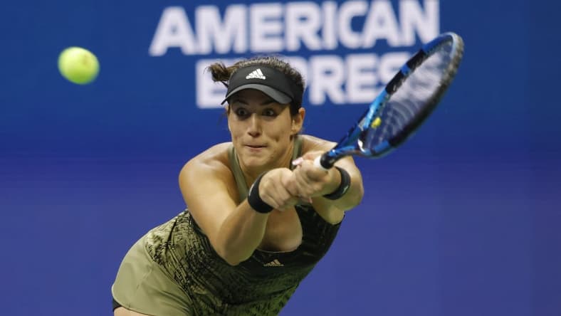 Sep 5, 2021; Flushing, NY, USA; Garbine Muguruza of Spain hits a backhand against Barbora Krejcikova of Czech Republic (not pictured) on day seven of the 2021 U.S. Open tennis tournament at USTA Billie Jean King National Tennis Center. Mandatory Credit: Geoff Burke-USA TODAY Sports