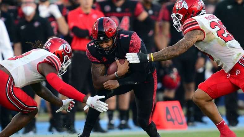 Sep 18, 2021; Carson, California, USA; San Diego State Aztecs quarterback Lucas Johnson (7) runs the ball against the Utah Utes during the second half at Dignity Health Sports Park. Mandatory Credit: Gary A. Vasquez-USA TODAY Sports