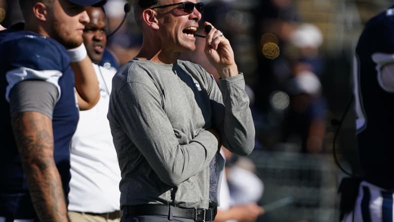 Sep 25, 2021; East Hartford, Connecticut, USA; Connecticut Huskies interim head coach Lou Spanos watches from the sideline against the Wyoming Cowboys during the first quarter at Rentschler Field at Pratt & Whitney Stadium. Mandatory Credit: David Butler II-USA TODAY Sports