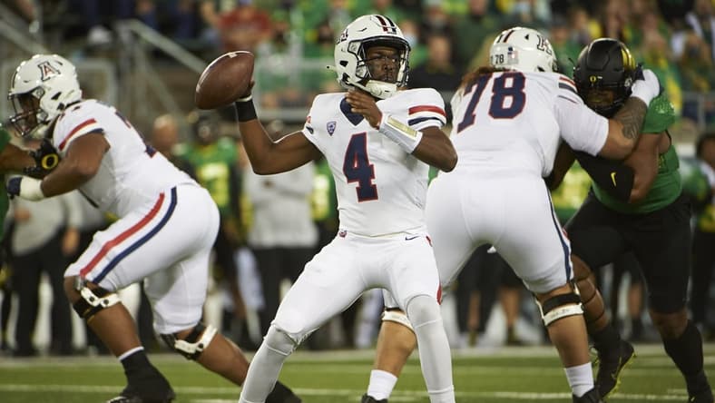 Sep 25, 2021; Eugene, Oregon, USA; Arizona Wildcats quarterback Jordan McCloud (4) throws a pass during the first half against the Oregon Ducks at Autzen Stadium. Mandatory Credit: Troy Wayrynen-USA TODAY Sports