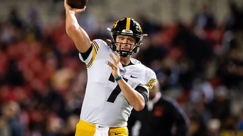 Oct 1, 2021; College Park, Maryland, USA; Iowa Hawkeyes quarterback Spencer Petras (7) warms up before the game against the Maryland Terrapins at Capital One Field at Maryland Stadium. Mandatory Credit: Scott Taetsch-USA TODAY Sports