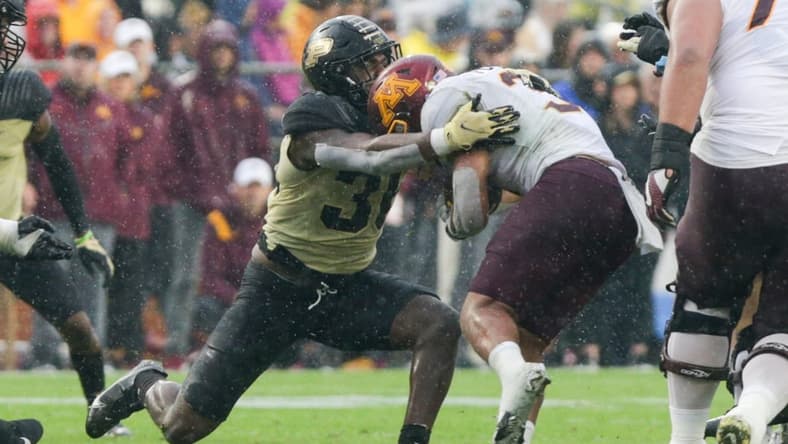 Purdue linebacker Jaylan Alexander (36) tackles Minnesota running back Trey Potts (3) during the third quarter of an NCAA college football game, Saturday, Oct. 2, 2021 at Ross-Ade Stadium in West Lafayette, Ind.

Cfb Purdue Vs Minnesota
