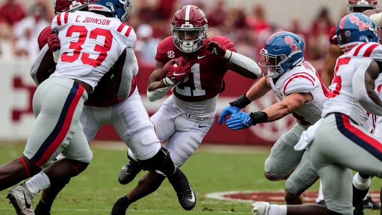 Oct 2, 2021; Tuscaloosa, Alabama, USA; Alabama Crimson Tide running back Jase McClellan (21) carries the ball against the Mississippi Rebels during the first half of an NCAA college football game at Bryant-Denny Stadium. Mandatory Credit: Butch Dill-USA TODAY Sports