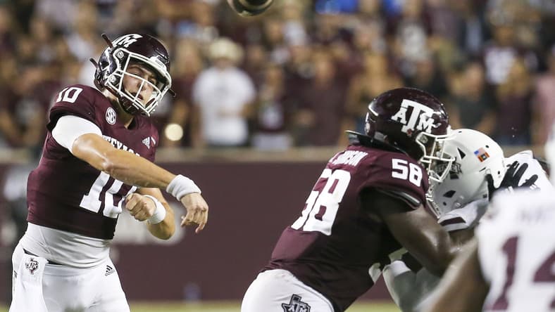 Oct 2, 2021; College Station, Texas, USA; Texas A&M Aggies quarterback Zach Calzada (10) passes against the Mississippi State Bulldogs in the fourth quarter at Kyle Field. Mandatory Credit: Thomas Shea-USA TODAY Sports