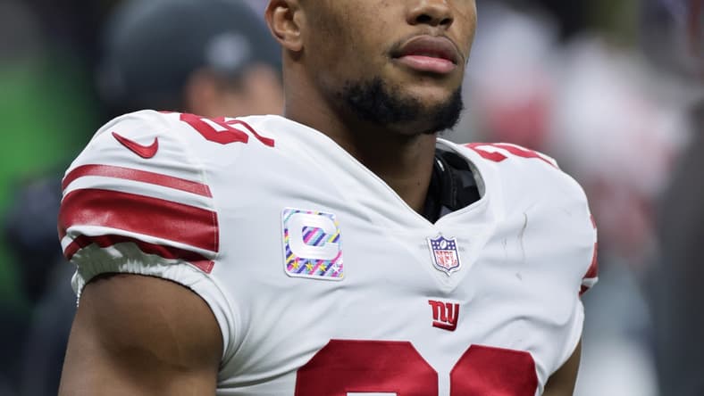 Oct 3, 2021; New Orleans, Louisiana, USA; New York Giants running back Saquon Barkley (26) looks on before the game against New Orleans Saints at Caesars Superdome. Mandatory Credit: Stephen Lew-USA TODAY Sports