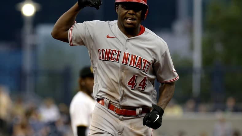 Oct 3, 2021; Pittsburgh, Pennsylvania, USA; Cincinnati Reds right fielder Aristides Aquino (44) gestures as he circles the bases on a solo home run against the Pittsburgh Pirates during the sixth inning at PNC Park. Mandatory Credit: Charles LeClaire-USA TODAY Sports