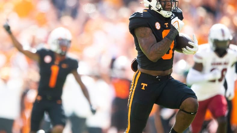 Tennessee running back Tiyon Evans (8) runs for a touchdown during a NCAA football game between the Tennessee Volunteers and the South Carolina Gamecocks at Neyland Stadium in Knoxville, Tenn. on Saturday, Oct. 9, 2021.
Kns Tennessee South Carolina Football Bp