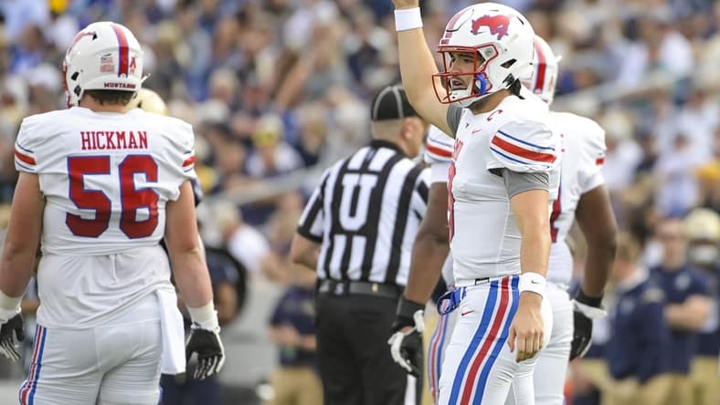 Oct 9, 2021; Annapolis, Maryland, USA;  Southern Methodist Mustangs quarterback Tanner Mordecai (8) signals after a play in the first half against the Navy Midshipmen at Navy-Marine Corps Memorial Stadium. Mandatory Credit: Tommy Gilligan-USA TODAY Sports