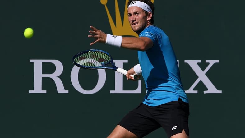 Oct 9, 2021; Indian Wells, CA, USA; Casper Ruud (NOR) hits a shot against Roberto Carballes Baena (ESP) at Indian Wells Tennis Garden. Mandatory Credit: Orlando Ramirez-USA TODAY Sports