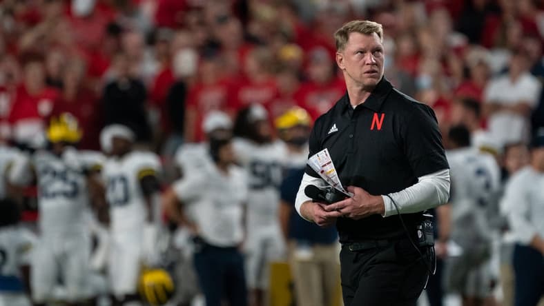 Oct 9, 2021; Lincoln, Nebraska, USA; Nebraska Cornhuskers head coach Scott Frost walks off the field after an injury timeout following a play against the Michigan Wolverines during the fourth quarter at Memorial Stadium. Mandatory Credit: Dylan Widger-USA TODAY Sports