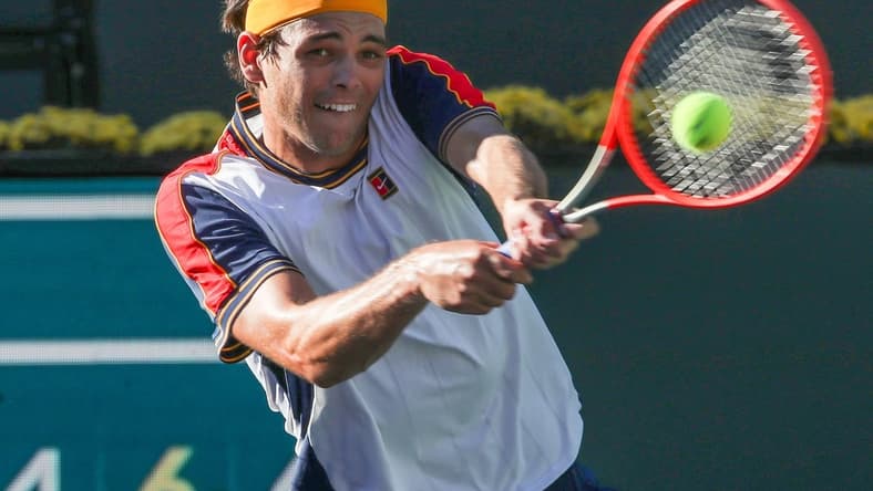 Taylor Fritz hits a shot against Alexander Zverev during their quarterfinal match at the BNP Paribas Open in Indian Wells, October 15, 2021.

Bnp Friday 22
