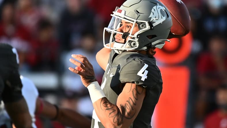 Oct 16, 2021; Pullman, Washington, USA; Washington State Cougars quarterback Jayden de Laura (4) throws a pass against the Stanford Cardinal in the first half at Gesa Field at Martin Stadium. Mandatory Credit: James Snook-USA TODAY Sports