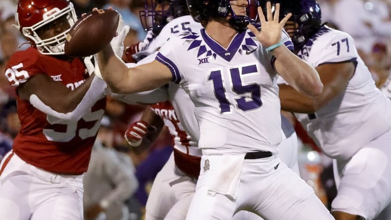 Oct 16, 2021; Norman, Oklahoma, USA; TCU Horned Frogs quarterback Max Duggan (15) throws during the first quarter against the Oklahoma Sooners at Gaylord Family-Oklahoma Memorial Stadium. Mandatory Credit: Kevin Jairaj-USA TODAY Sports