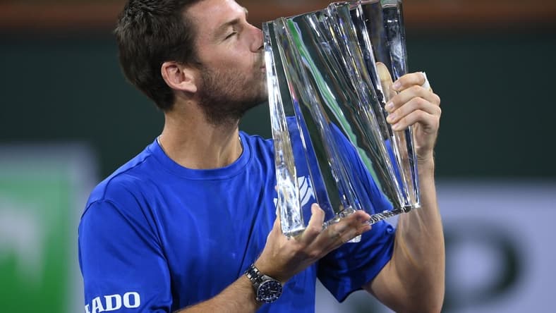 Oct 17, 2021; Indian Wells, CA, USA;  Cameron Norrie (GBR) holds the championship trophy after defeating Nikoloz Basilashvili (GEO) in the men   s final in the BNP Paribas Open at the Indian Wells Tennis Garden. Mandatory Credit: Jayne Kamin-Oncea-USA TODAY Sports