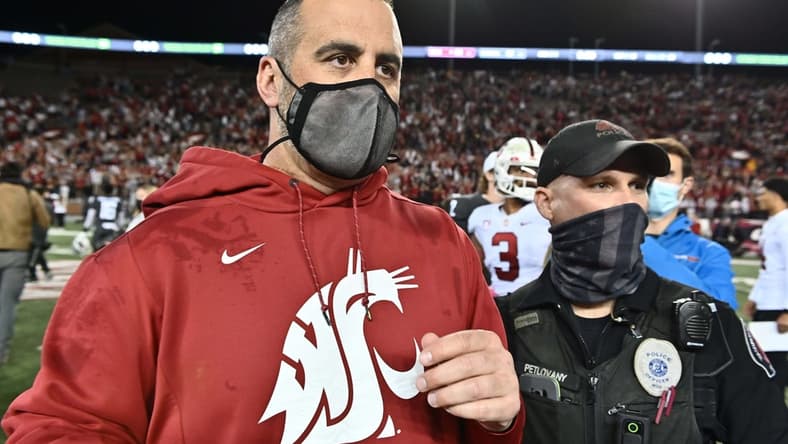 Oct 16, 2021; Pullman, Washington, USA; Washington State Cougars head coach Nick Rolovich celebrates after a game against the Stanford Cardinal at Gesa Field at Martin Stadium. The Cougars won 34-31. Mandatory Credit: James Snook-USA TODAY Sports