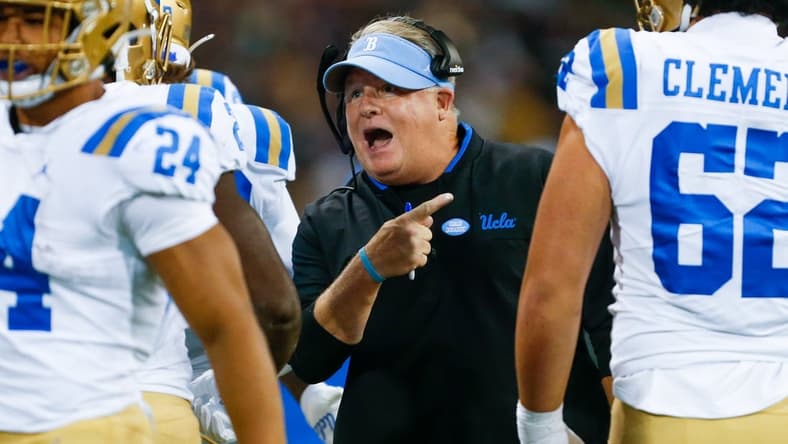Oct 16, 2021; Seattle, Washington, USA; UCLA Bruins head coach Chip Kelly reacts following a touchdown against the Washington Huskies during the second quarter at Alaska Airlines Field at Husky Stadium. Mandatory Credit: Joe Nicholson-USA TODAY Sports
