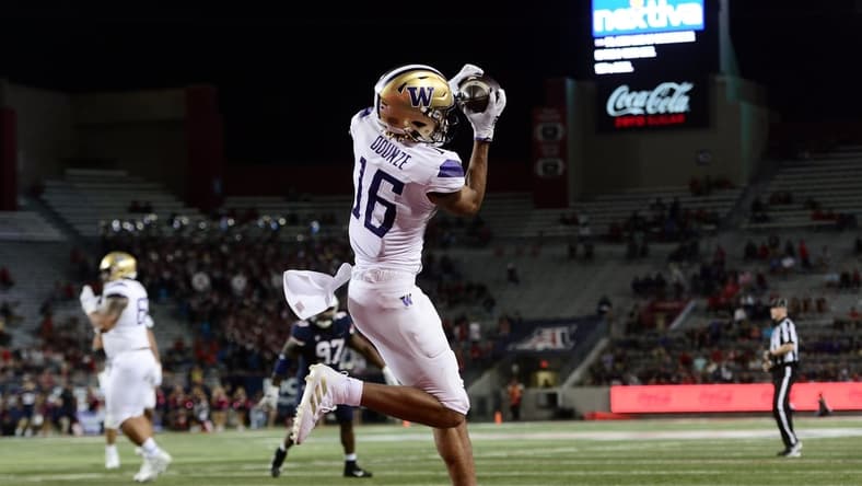 Oct 22, 2021; Tucson, Arizona, USA; Washington Huskies wide receiver Rome Odunze (16) catches a touchdown pass against the Arizona Wildcats during the second half at Arizona Stadium. Mandatory Credit: Joe Camporeale-USA TODAY Sports