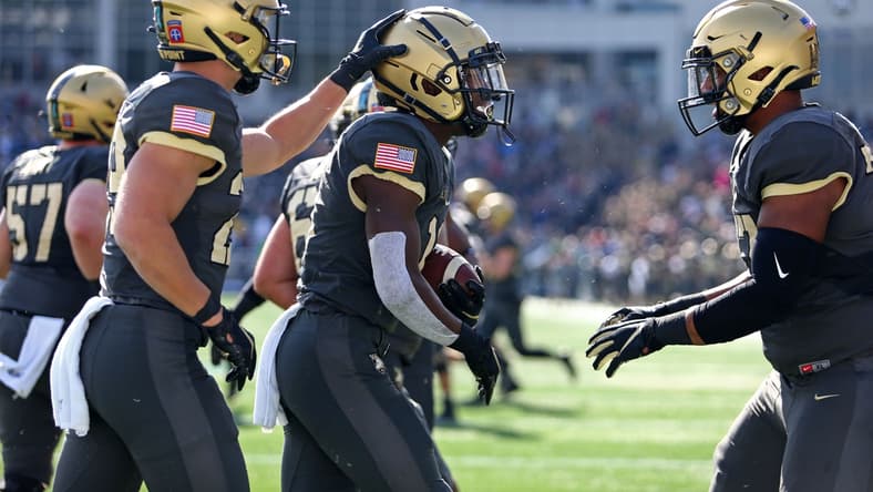 Oct 23, 2021; West Point, New York, USA; Army Black Knights running back Brandon Walters (11) celebrates after his touchdown against the Wake Forest Demon Deacons  during the first half at Michie Stadium. Mandatory Credit: Danny Wild-USA TODAY Sports