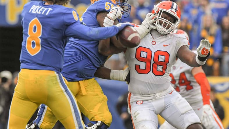 Pitt quarterback Kenny Pickett (8) throws near  Clemson defensive end Myles Murphy (98) trying to get by Pitt offensive lineman Marcus Minor (55)  during the second quarter at Heinz Field in Pittsburgh, Pennsylvania, Saturday, October 23, 2021.

Ncaa Football Clemson At Pitt