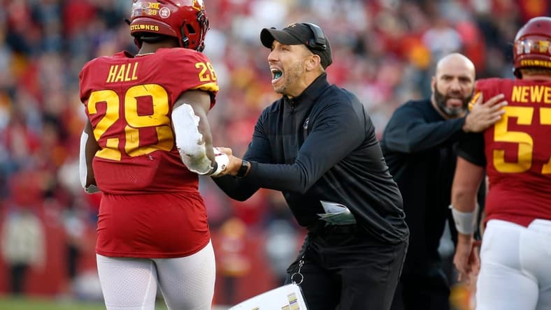 Iowa State head football coach Matt Campbell celebrates with running back Breece Hall after Hall scored a touchdown in the fourth quarter to help the Cyclones upset No. 8-ranked Oklahoma State on Saturday, Oct. 23, 2021, at Jack Trice Stadium in Ames.

20211023 Iowastatevsokst