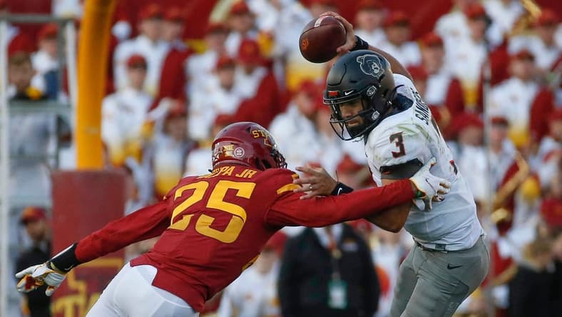 Iowa State sophomore defensive back T.J. Tampa Jr., hits Oklahoma State quarterback Spencer Sanders in the third quarter on Saturday, Oct. 23, 2021, at Jack Trice Stadium in Ames.

20211023 Iowastatevsokst