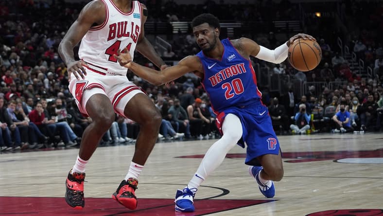 Oct 23, 2021; Chicago, Illinois, USA; Detroit Pistons guard Josh Jackson (20) drives against Chicago Bulls forward Patrick Williams (44) during the second half at United Center. Mandatory Credit: David Banks-USA TODAY Sports