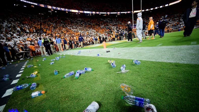 Trash litters the sidelines during an SEC football game between Tennessee and Ole Miss at Neyland Stadium in Knoxville, Tenn. on Saturday, Oct. 16, 2021. Tennessee fans threw debris onto the field in objection to a ruling on a play in the end of the fourth quarter.

Kns Tennessee Ole Miss Football