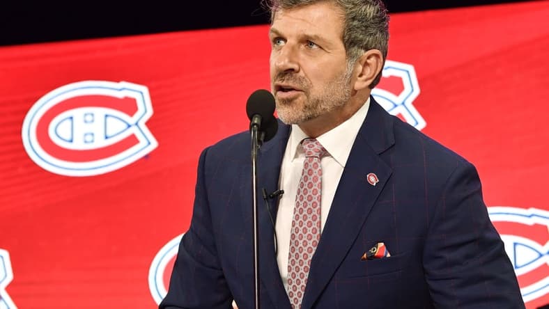 Jun 22, 2018; Dallas, TX, USA; Montreal Canadiens general manager Marc Bergevin announces the third overall pick in the first round of the 2018 NHL Draft at American Airlines Center. Mandatory Credit: Jerome Miron-USA TODAY Sports