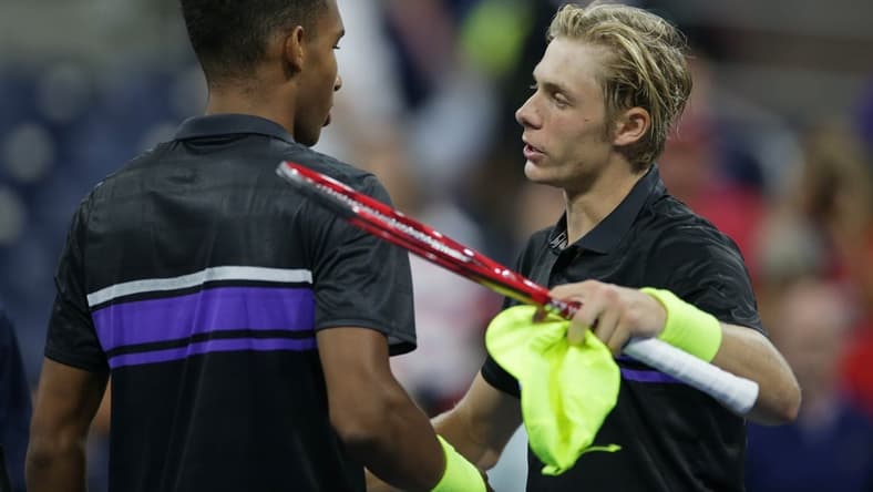 Aug 27, 2019; Flushing, NY, USA; Denis Shapovalov of Canada (right) greets Felix Auger-Aliassime of Canada (left) after a first round match on day two of the 2019 U.S. Open tennis tournament at USTA Billie Jean King National Tennis Center. Mandatory Credit: Jerry Lai-USA TODAY Sports