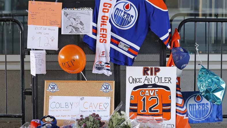 Apr 13, 2020; Edmonton, Alberta, Canada; Edmonton Oilers fans have set up a memorial outside Rogers Place to honor Colby Cave, who passed away on Saturday April 11, 2020. Mandatory Credit: Perry Nelson-USA TODAY Sports