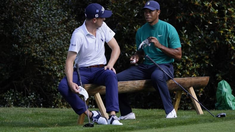 Nov 9, 2020; Augusta, Georgia, USA; Justin Thomas (left) and Tiger Woods wait to hit on the 15th tee during a practice round for The Masters golf tournament at Augusta National GC. Mandatory Credit: Michael Madrid-USA TODAY Sports