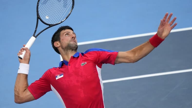 Jul 30, 2021; Tokyo, Japan; Novak Djokovic (SRB) serves against Alexander Zverev (GER) in the men's singles semifinals during the Tokyo 2020 Olympic Summer Games at Ariake Tennis Park. Mandatory Credit: Robert Deutsch-USA TODAY Sports