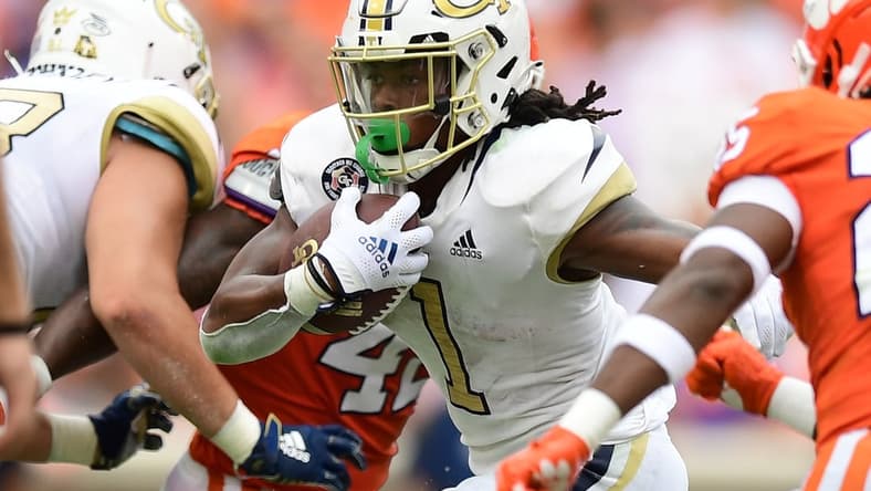 Sep 18, 2021; Clemson, South Carolina, USA; Georgia Tech Yellow Jackets running back Jahmyr Gibbs (1) carries the ball against the Clemson Tigers during the second quarter at Memorial Stadium. Mandatory Credit: Adam Hagy-USA TODAY Sports