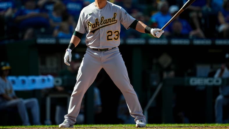 Sep 16, 2021; Kansas City, Missouri, USA; Oakland Athletics catcher Yan Gomes (23) bats against the Kansas City Royals during the eighth inning at Kauffman Stadium. Mandatory Credit: Jay Biggerstaff-USA TODAY Sports