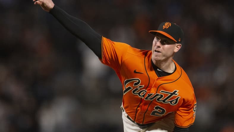 Oct 1, 2021; San Francisco, California, USA; San Francisco Giants starting pitcher Anthony DeSclafani(26) delivers a pitch against the San Diego Padres during the second inning at Oracle Park. Mandatory Credit: D. Ross Cameron-USA TODAY Sports
